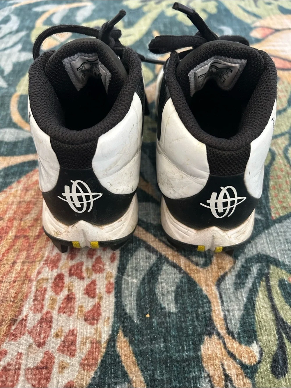 Nike Kids Black and White High-Top cleats
